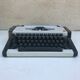 Olympia traveller luxury typewriter with its trunk