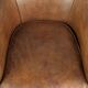Vintage sheepskin club armchair finished with decorative nails