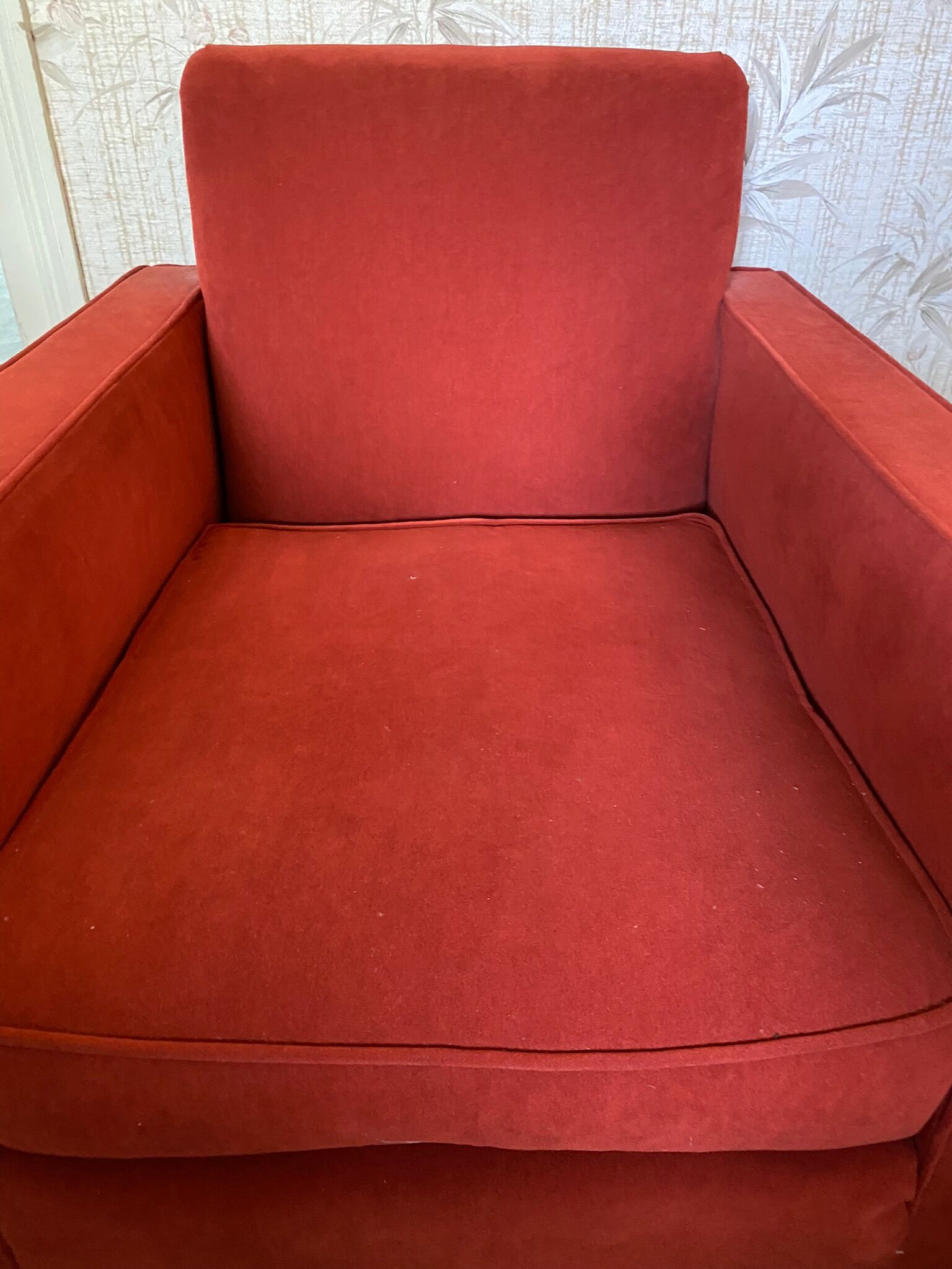 Vintage cubic armchair covered with red fabric