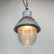 Grey industrial explosion proof light from Crouse-Hinds, 1970s