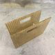 Vintage magazine rack in plexiglass and cane.