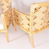Pair of rattan armchairs with fan patterns