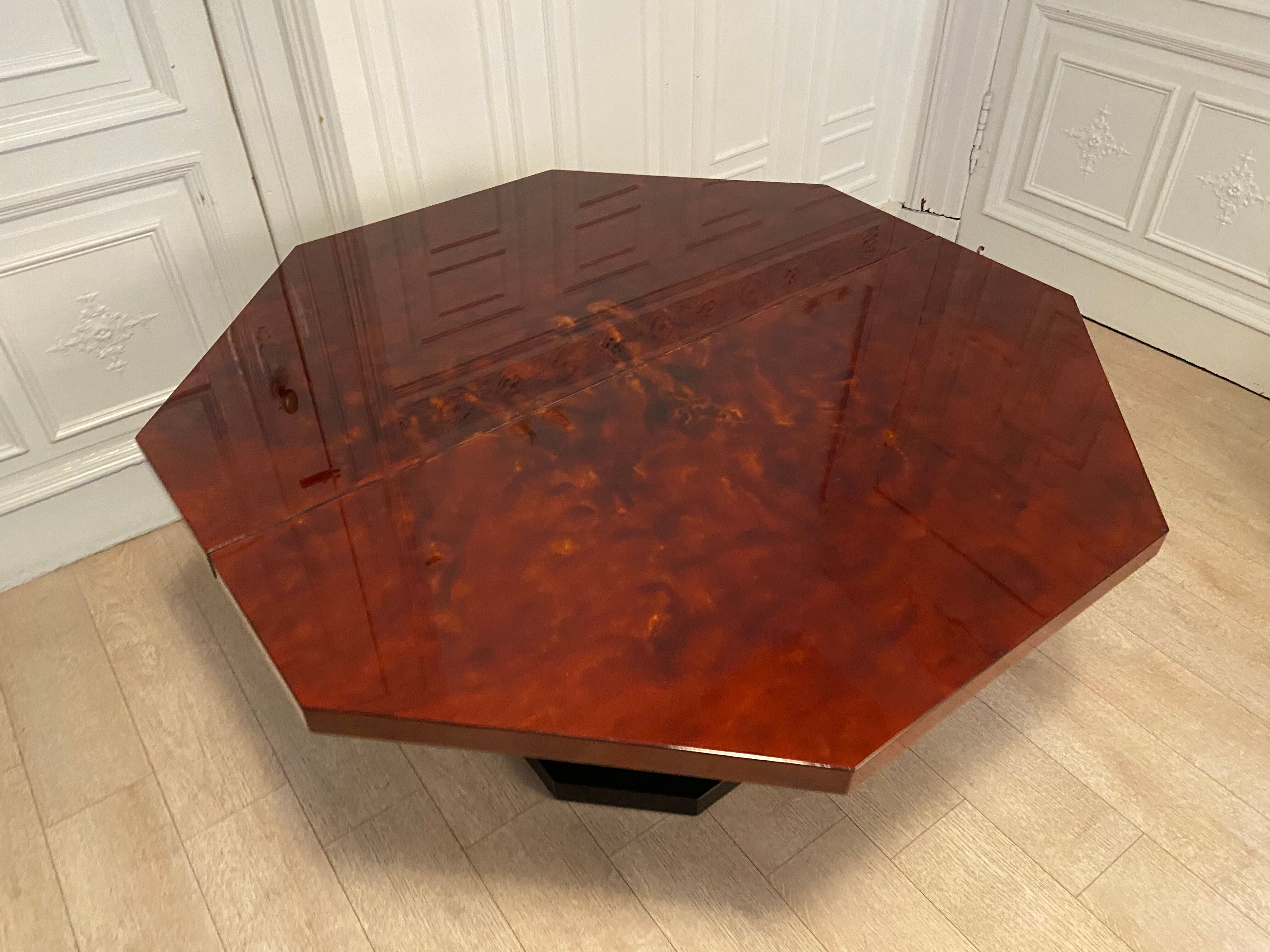 Red lacquered dining table and gold dust, 1970s