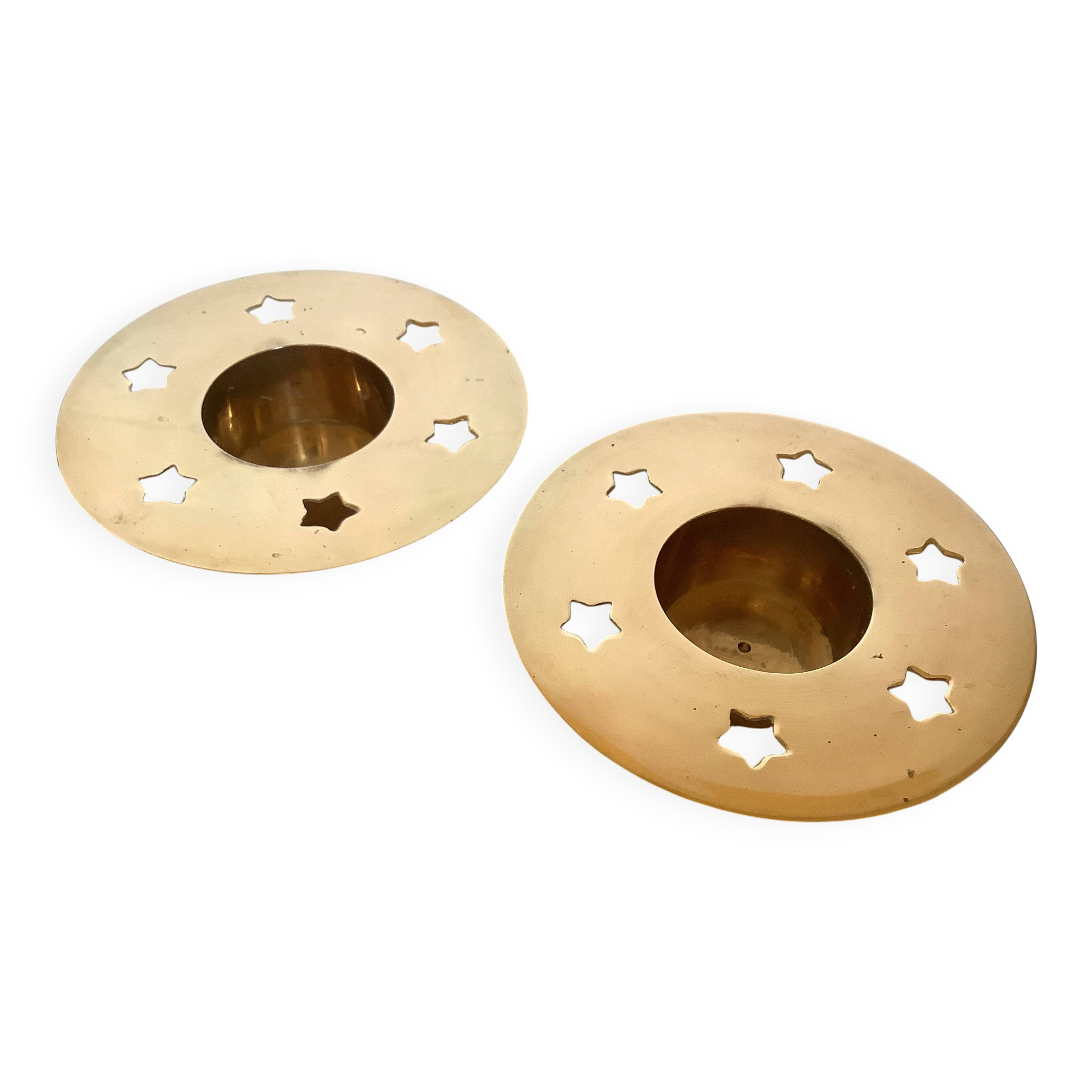 Pair of star candle holders in brass