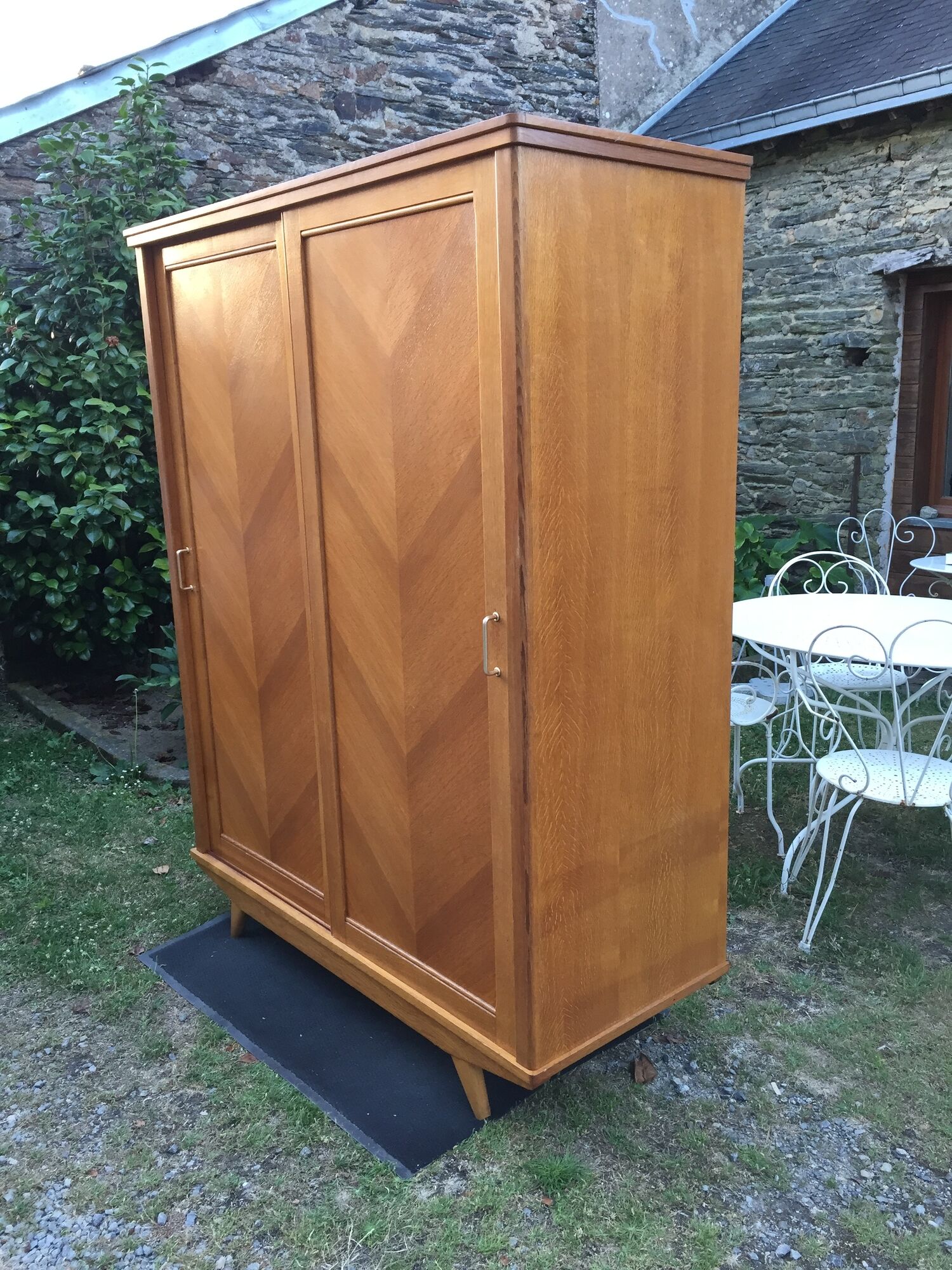 Vintage wardrobe with compass feet in oak and oak cp with 2 sliding doors.