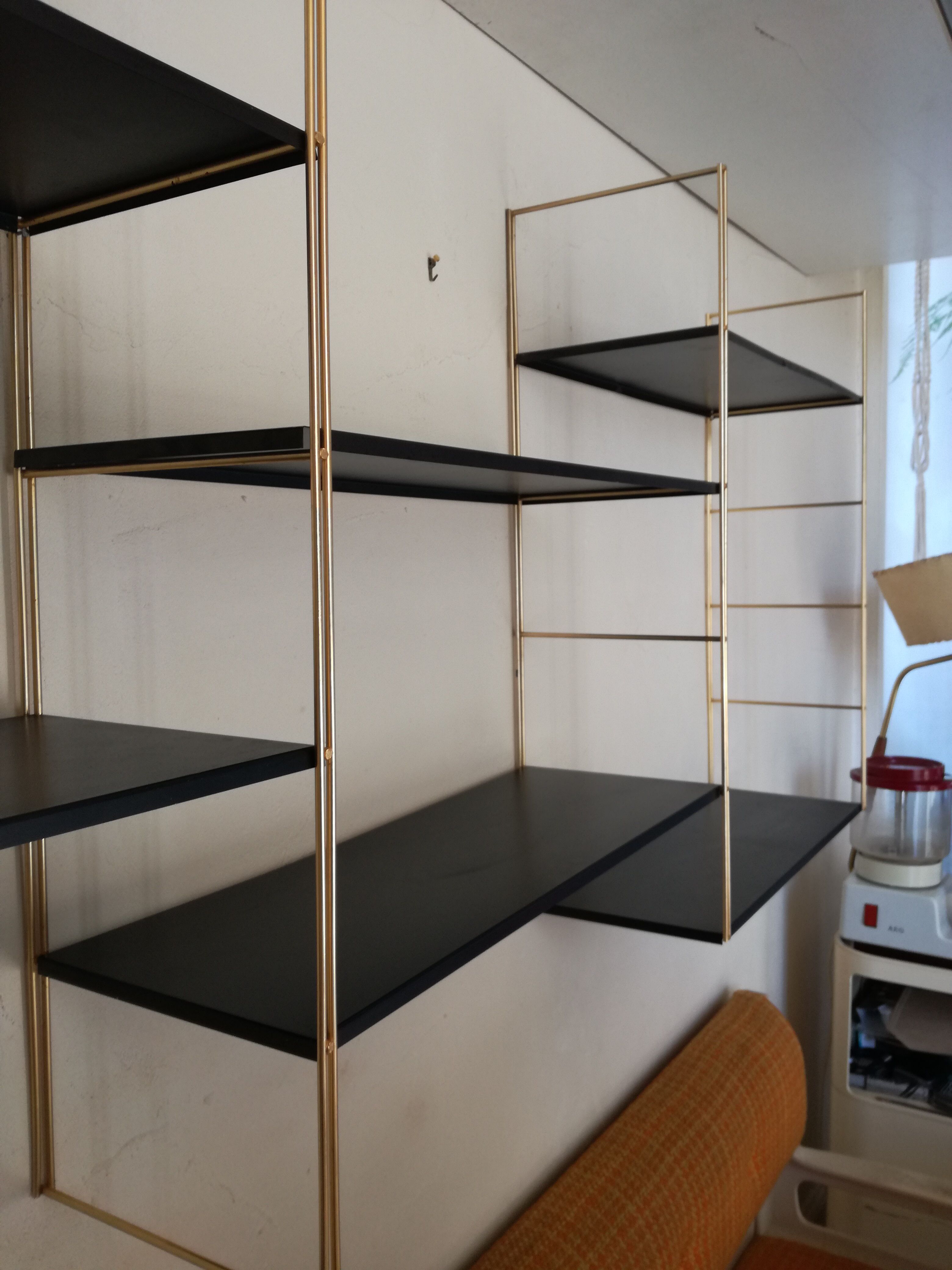 Gold and black thong shelf