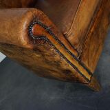 Vintage club armchair in leather color cognac Netherlands