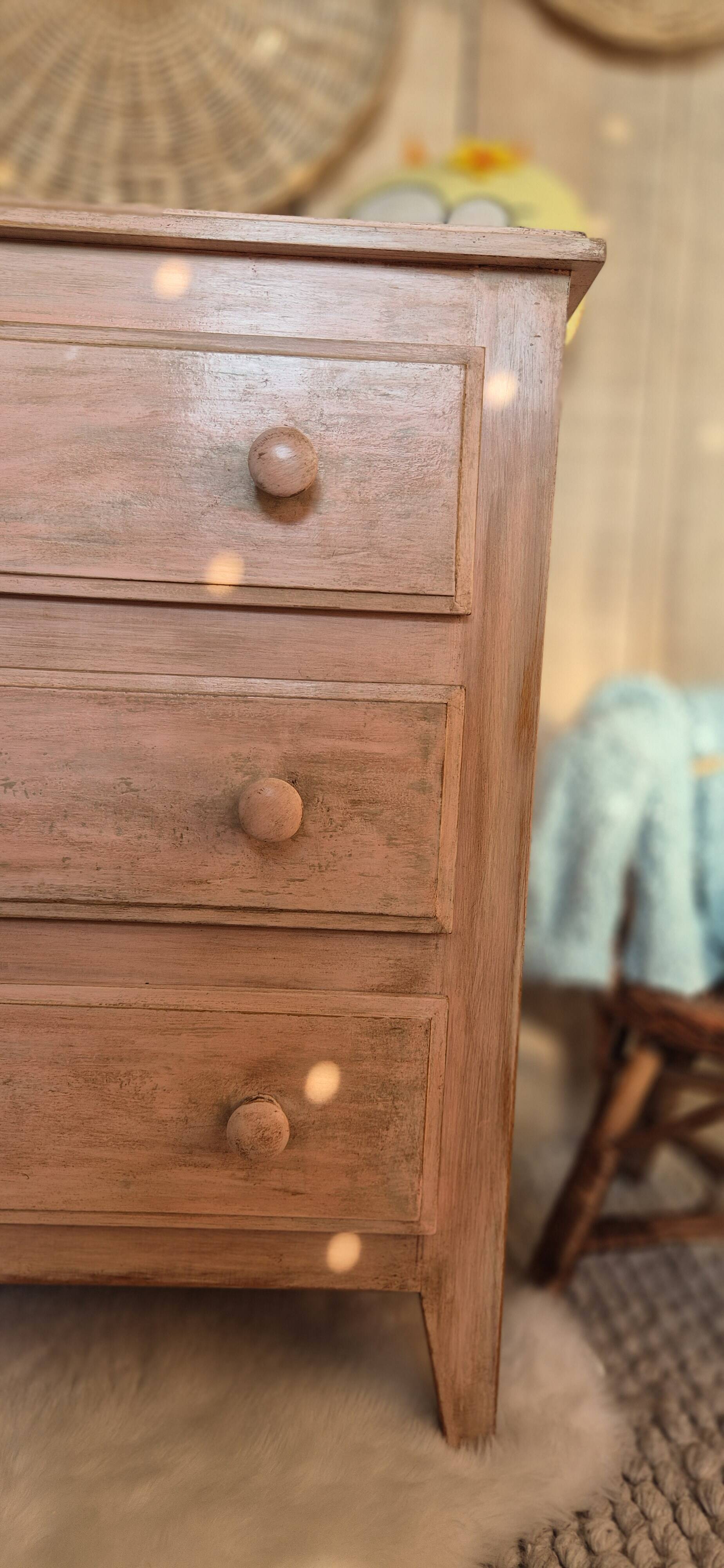 Small Parisian-style chest of drawers patinated in pink.