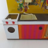 Kitchen doll, child in tole 70s