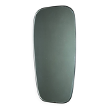 Vintage 1960 free-form mirror known as a retro mirror with a gold and black metal trim.