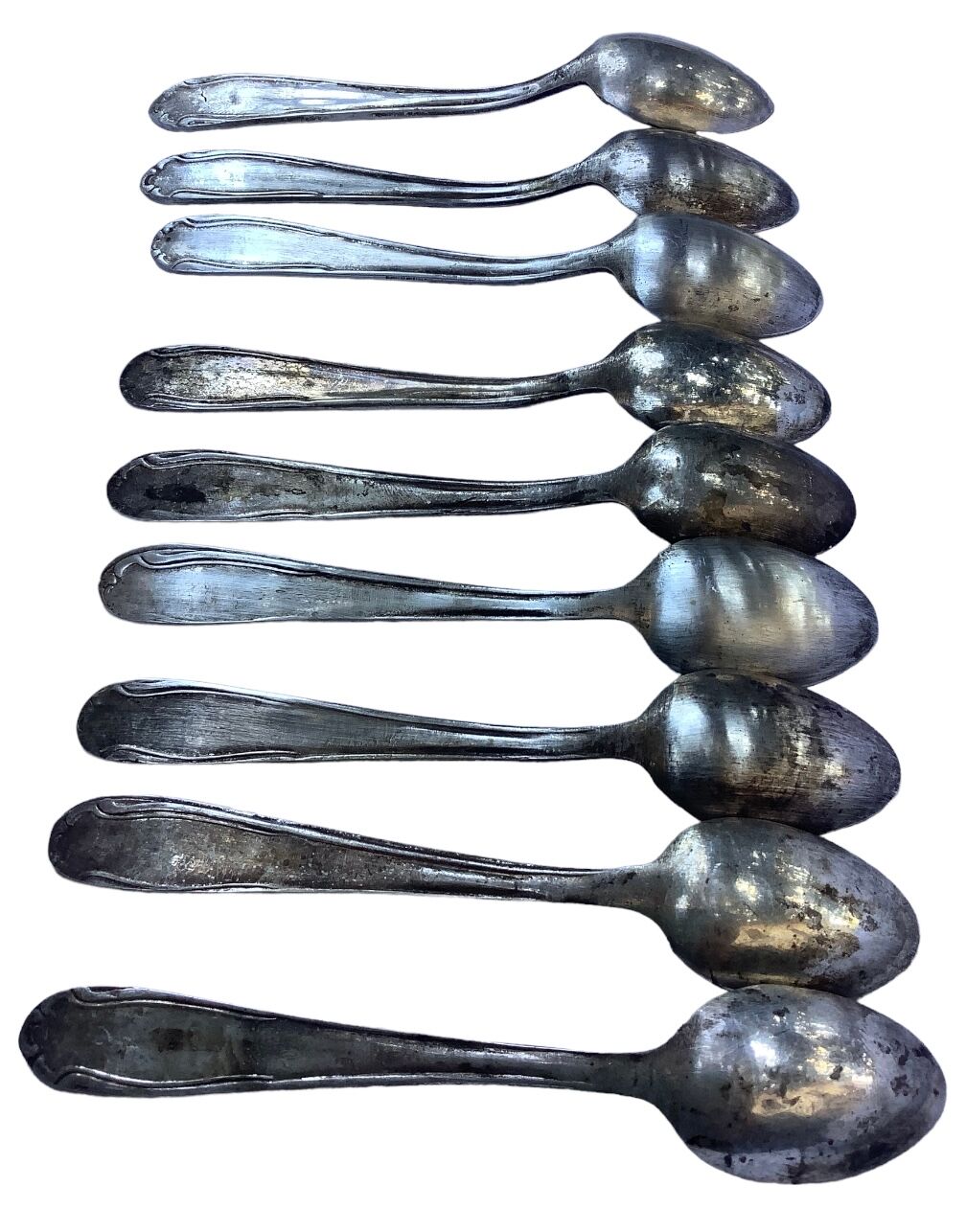 Nine small silver teaspoons
