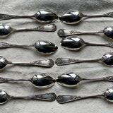 Set of 12 small silver-plated metal spoons in Art Nouveau style.