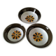 Set of three Italian deep plates from the 1970s, with ochre brown floral decoration.