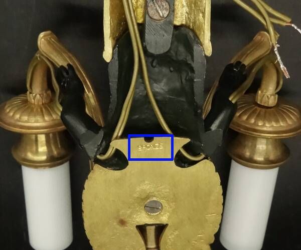 Pair of winged putti wall sconces in Louis XVI style - gilded bronze and black patina