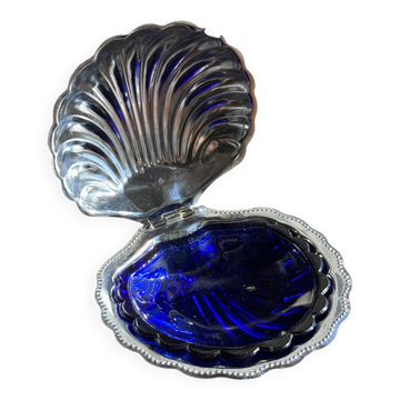 Vintage silver-plated shell butter dish with blue bowl.