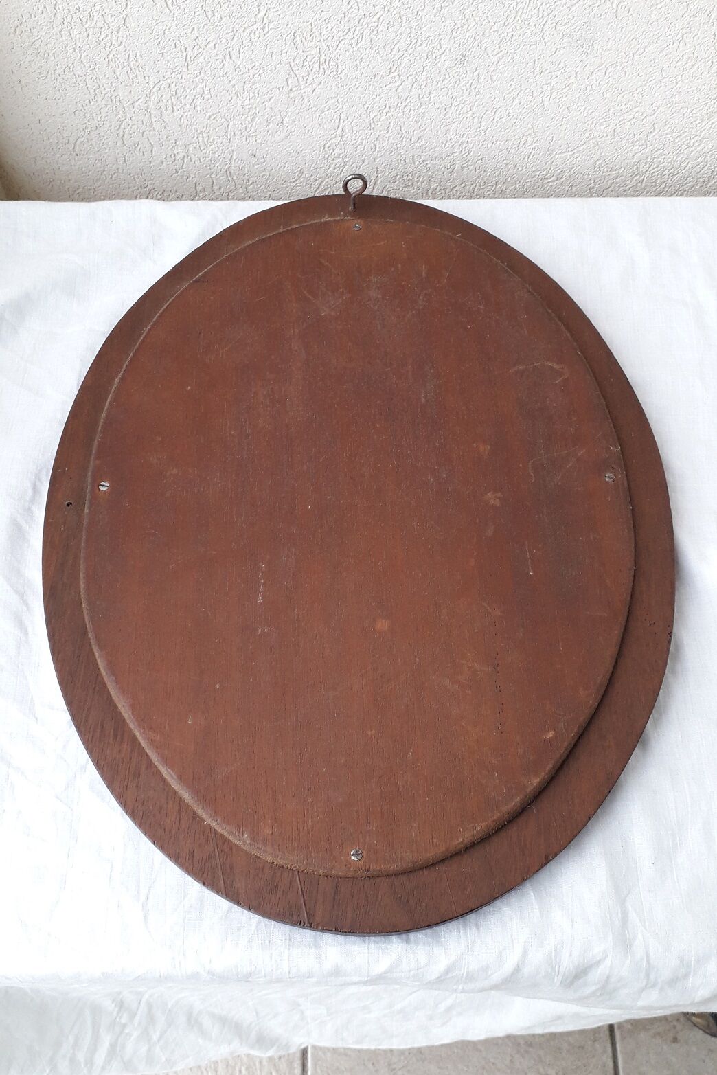Oval wooden mirror