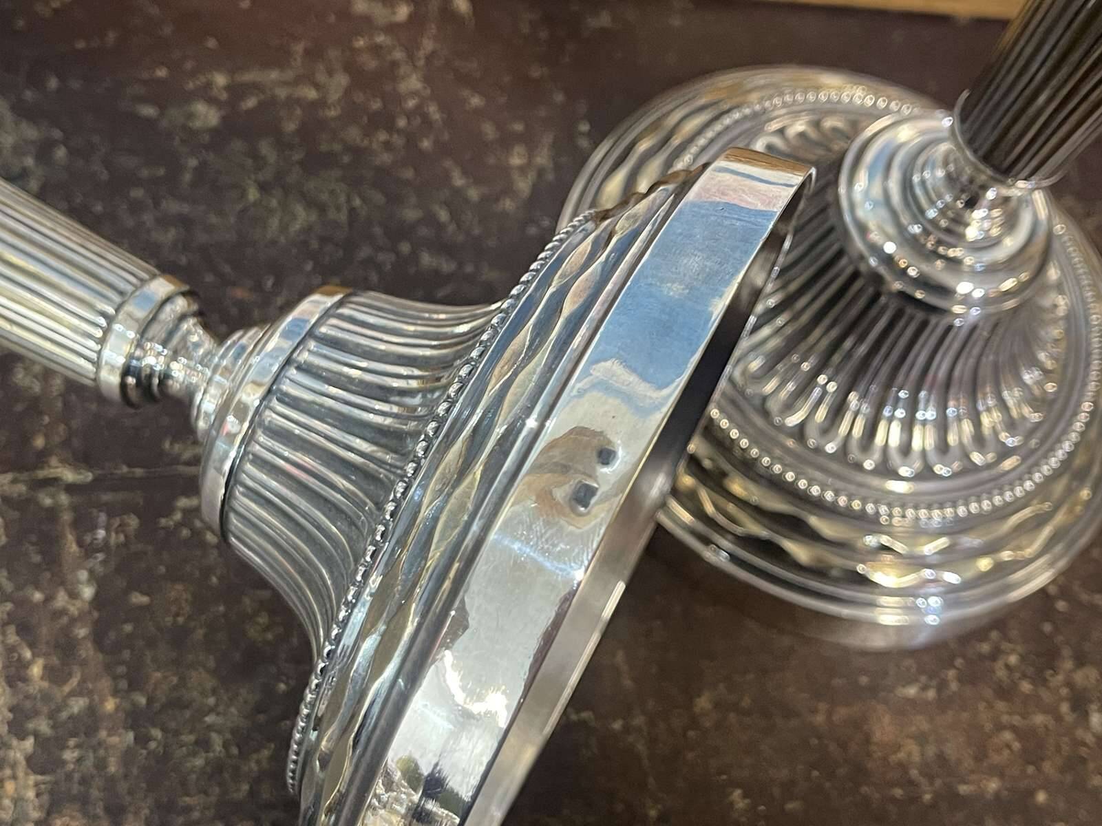 Pair of silver-plated bronze candlesticks from the early 20th century