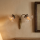 Double bronze wall light with glass tulips Art Deco