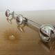 3-70s gold metal coat holder