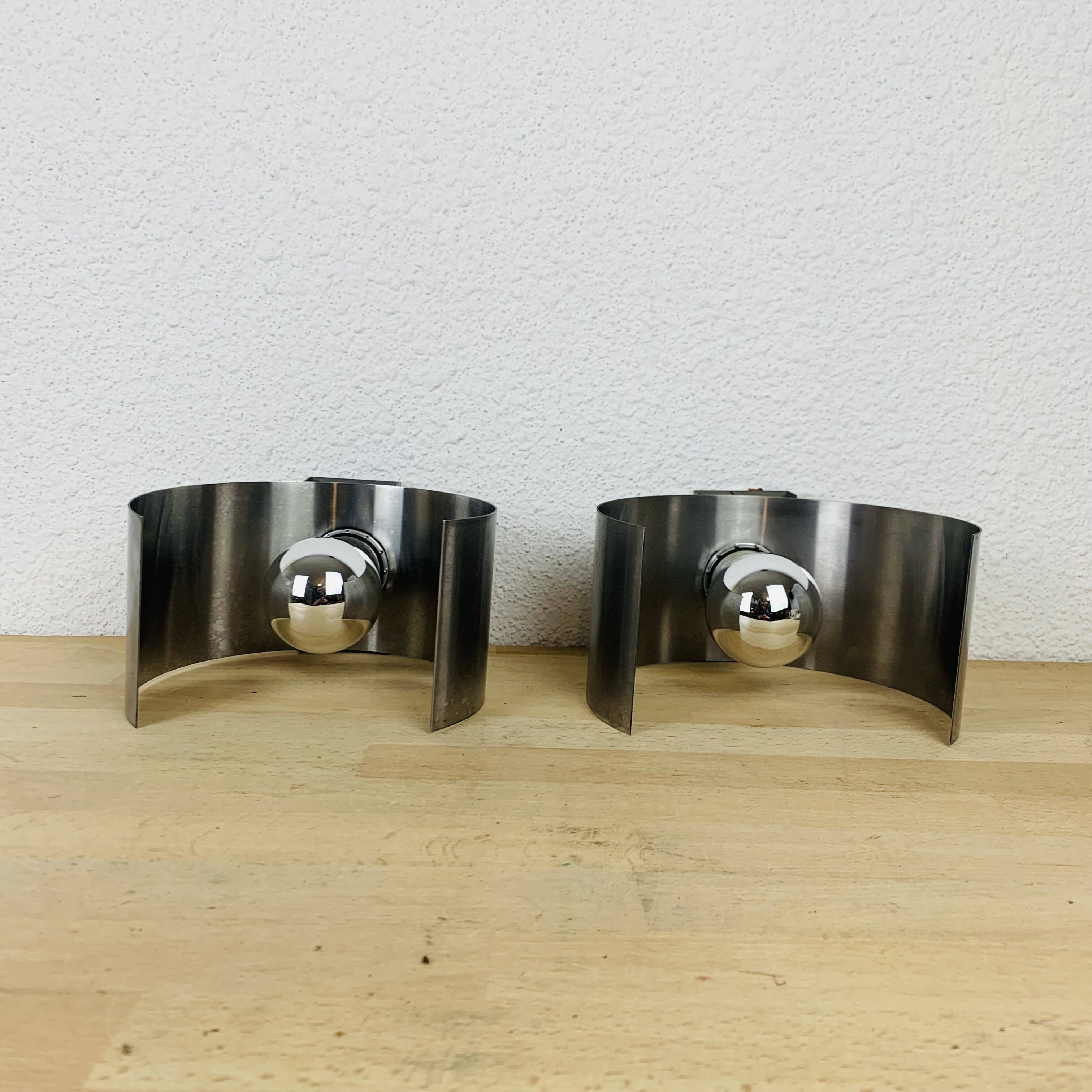 Pair of 70's brushed aluminum space age wall lights