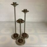 Trio of metal and wood candlesticks