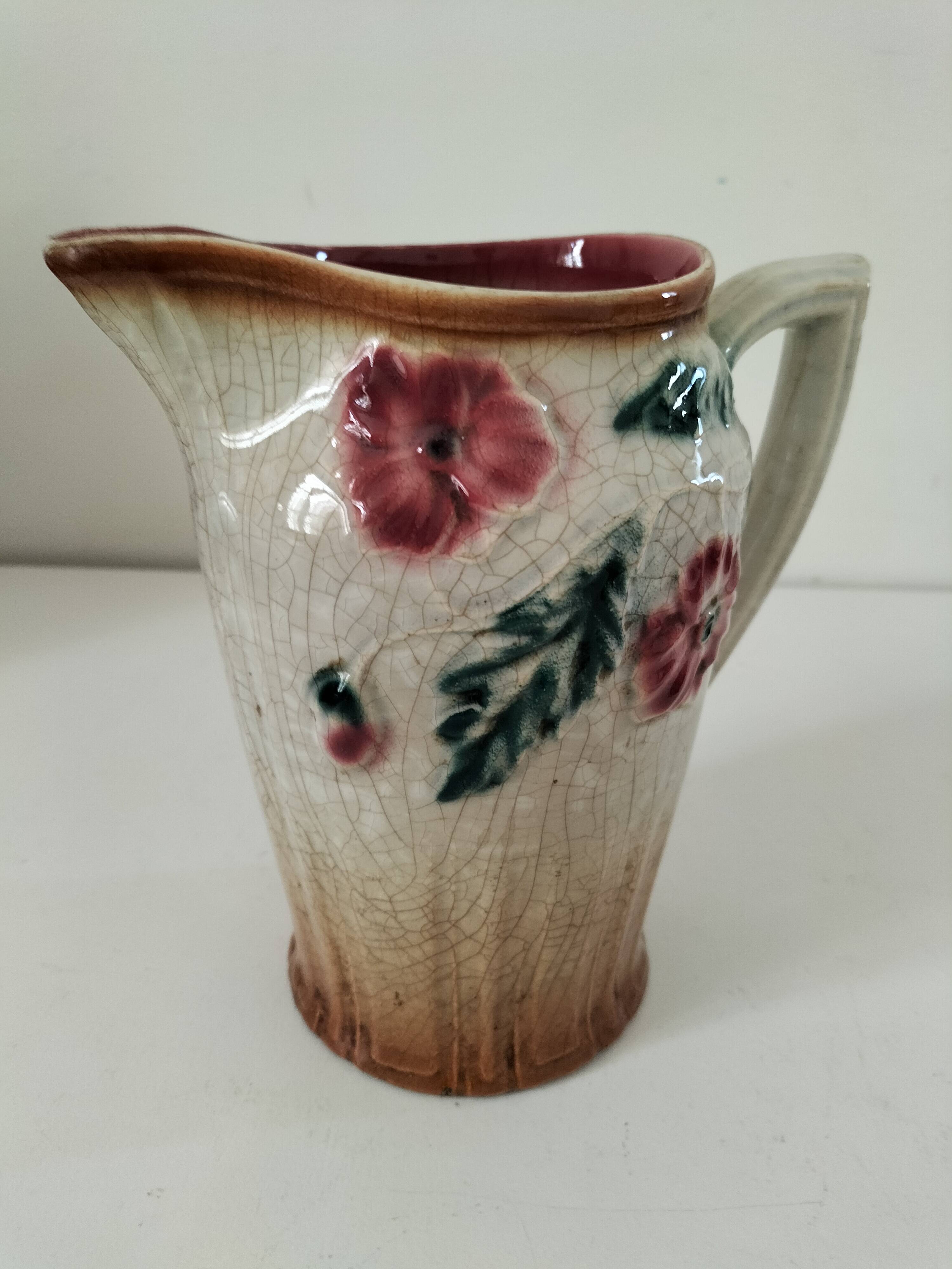 Moulded slip pitcher - late 19th century - Floral decoration in relief