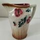 Moulded slip pitcher - late 19th century - Floral decoration in relief