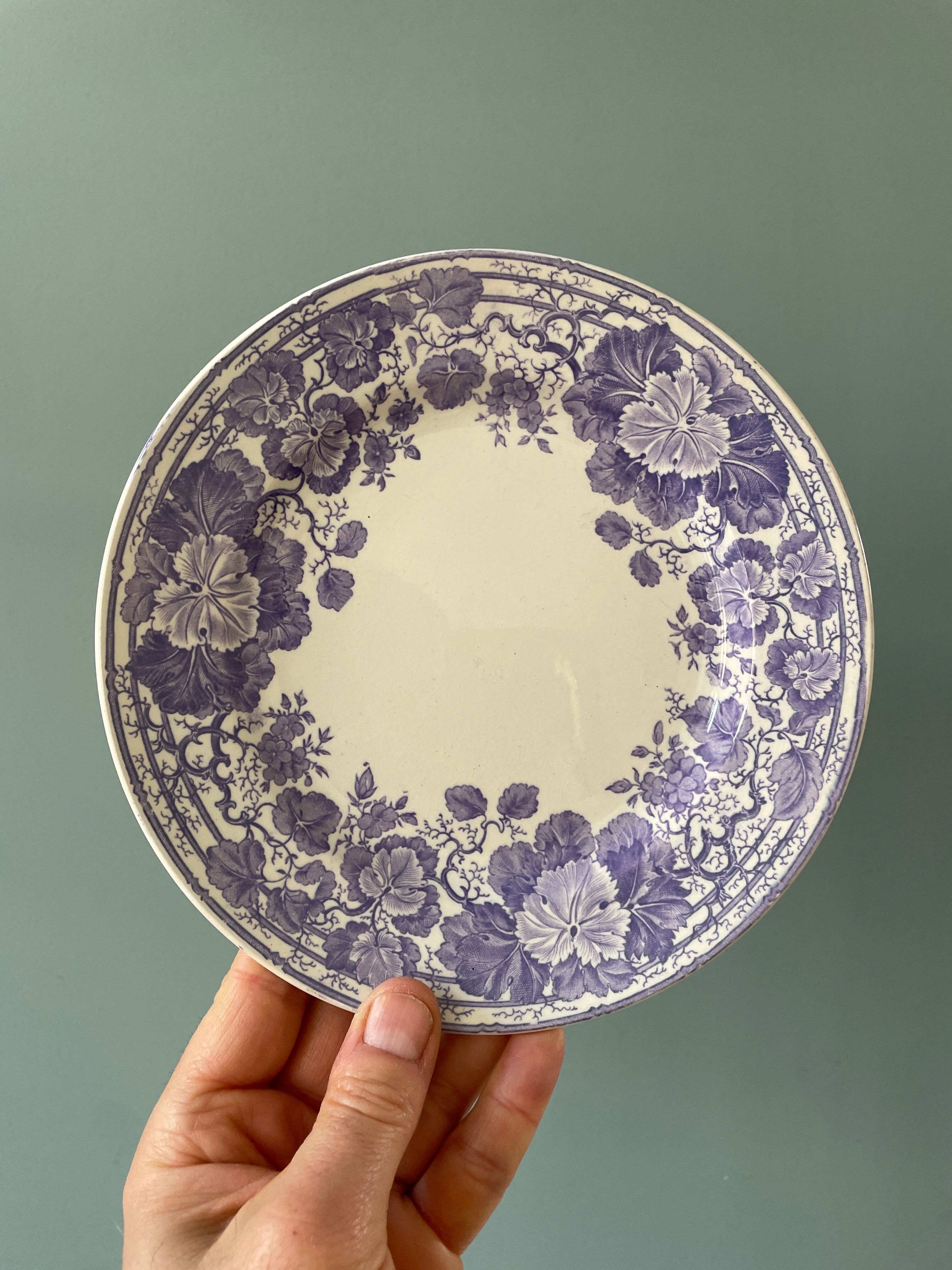 Series of 12 mismatched Terre de Fer dessert plates