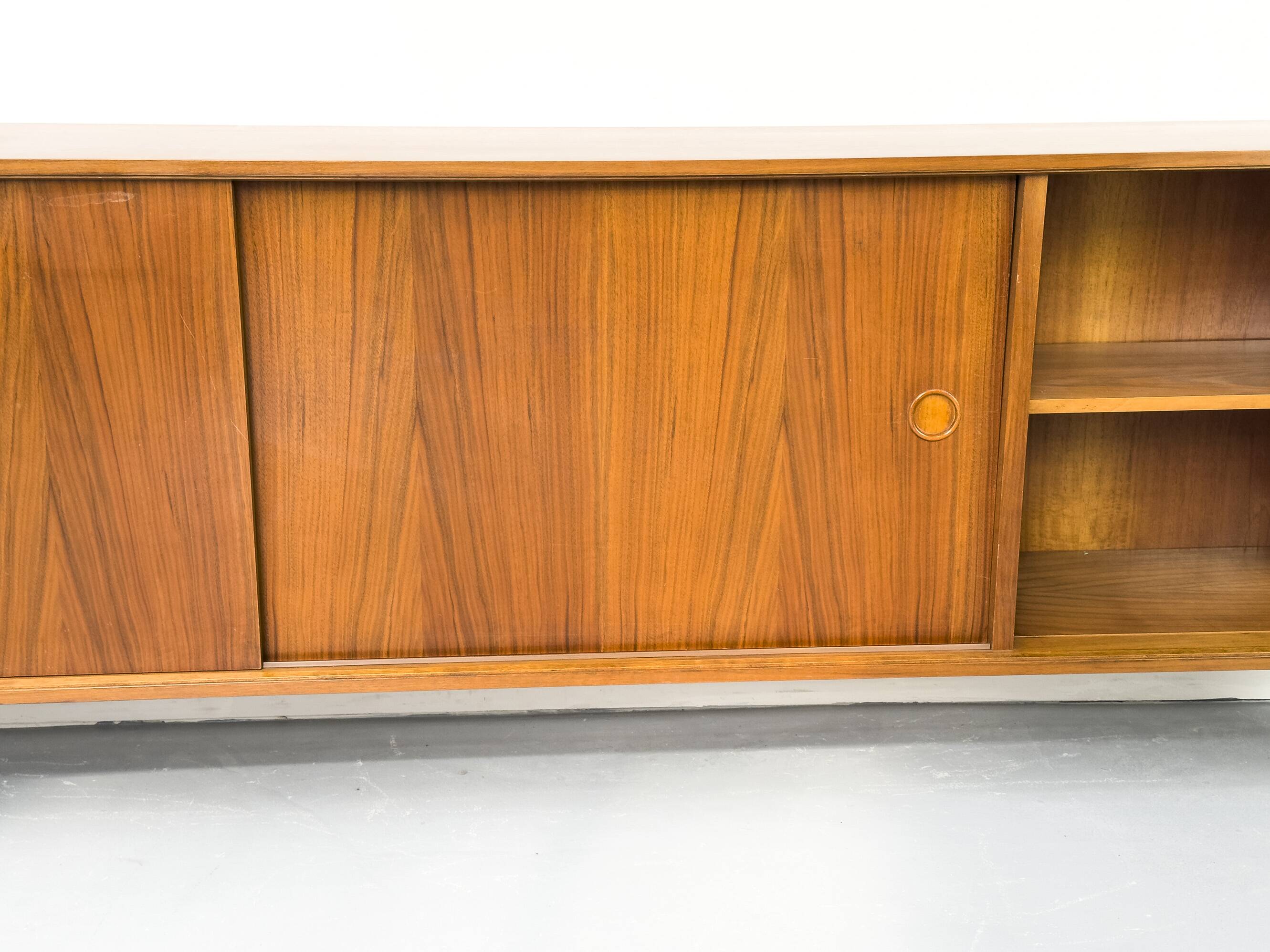 Walnut sideboard with sliding doors by Franzmeyer, 1959