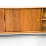 Walnut sideboard with sliding doors by Franzmeyer, 1959