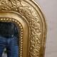 Old Louis Philippe style mirror in gilded wood with pediment