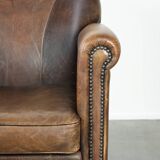 Armchair / lounge chair made of sheepskin leather with characterful patina