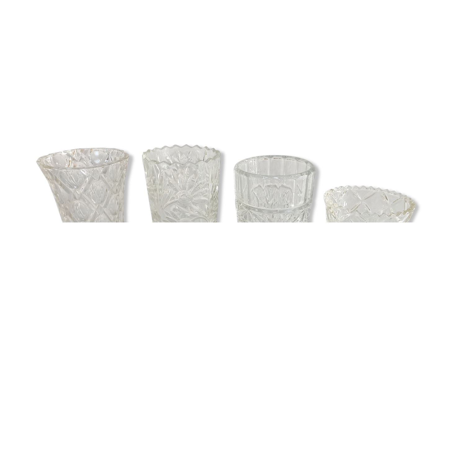 Four bohemian crystal vases