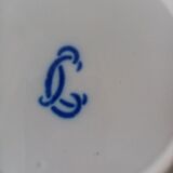 18th century earthenware decorative plate signed Saint Clement with royal coat of arms decoration