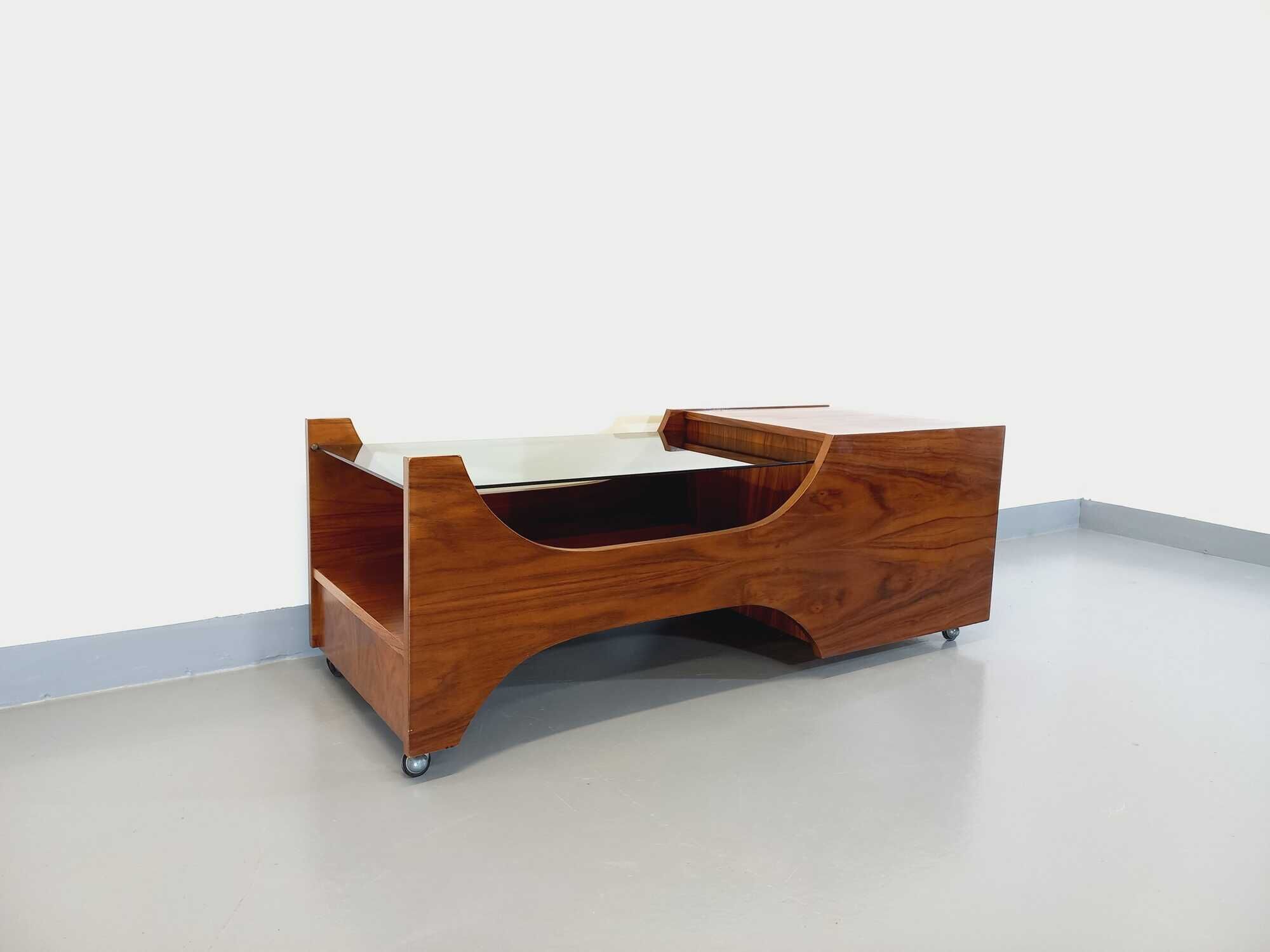 Vintage bar coffee table on rosewood wheels and smoked glass from the 60s
