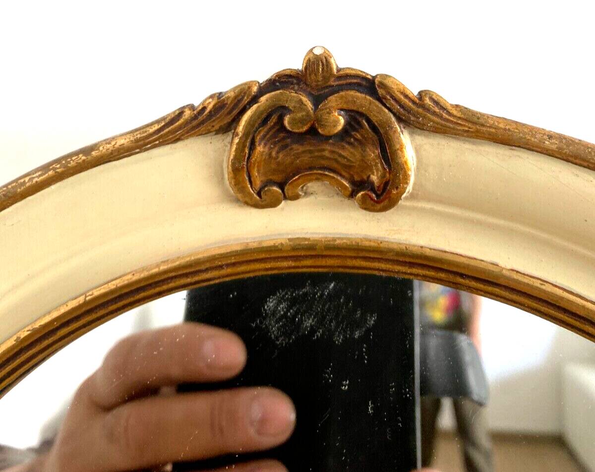 Mirror in wood and stucco with gilded highlights 20th century