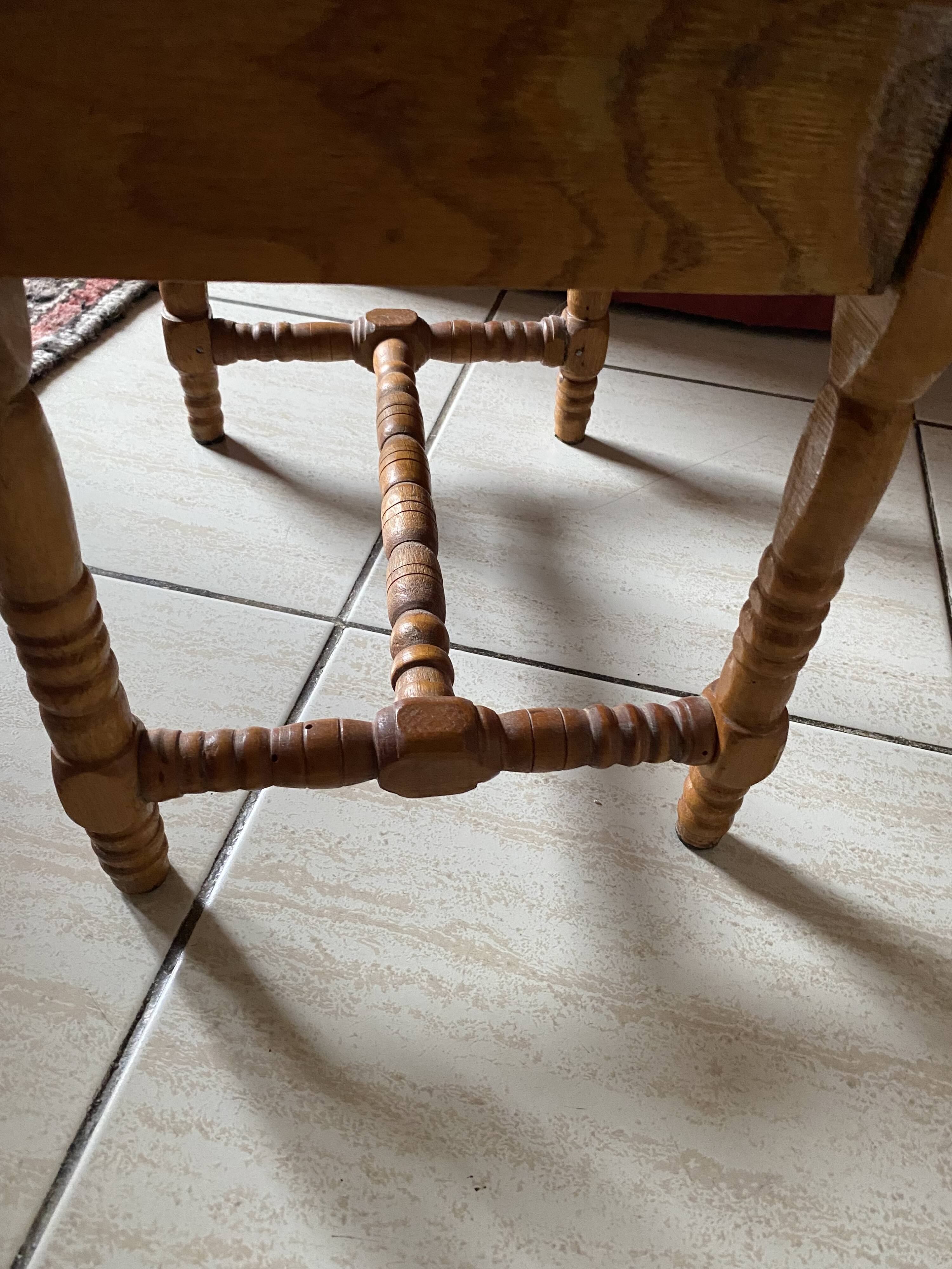 Small footrest bench in bohemian style.