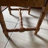 Small footrest bench in bohemian style.