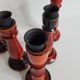 Set of five wooden candlesticks turned in the colors of "Pompeï"