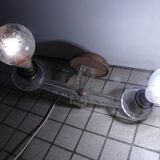 Adjustable double-arm wall light in plexiglass and brass, 1950.