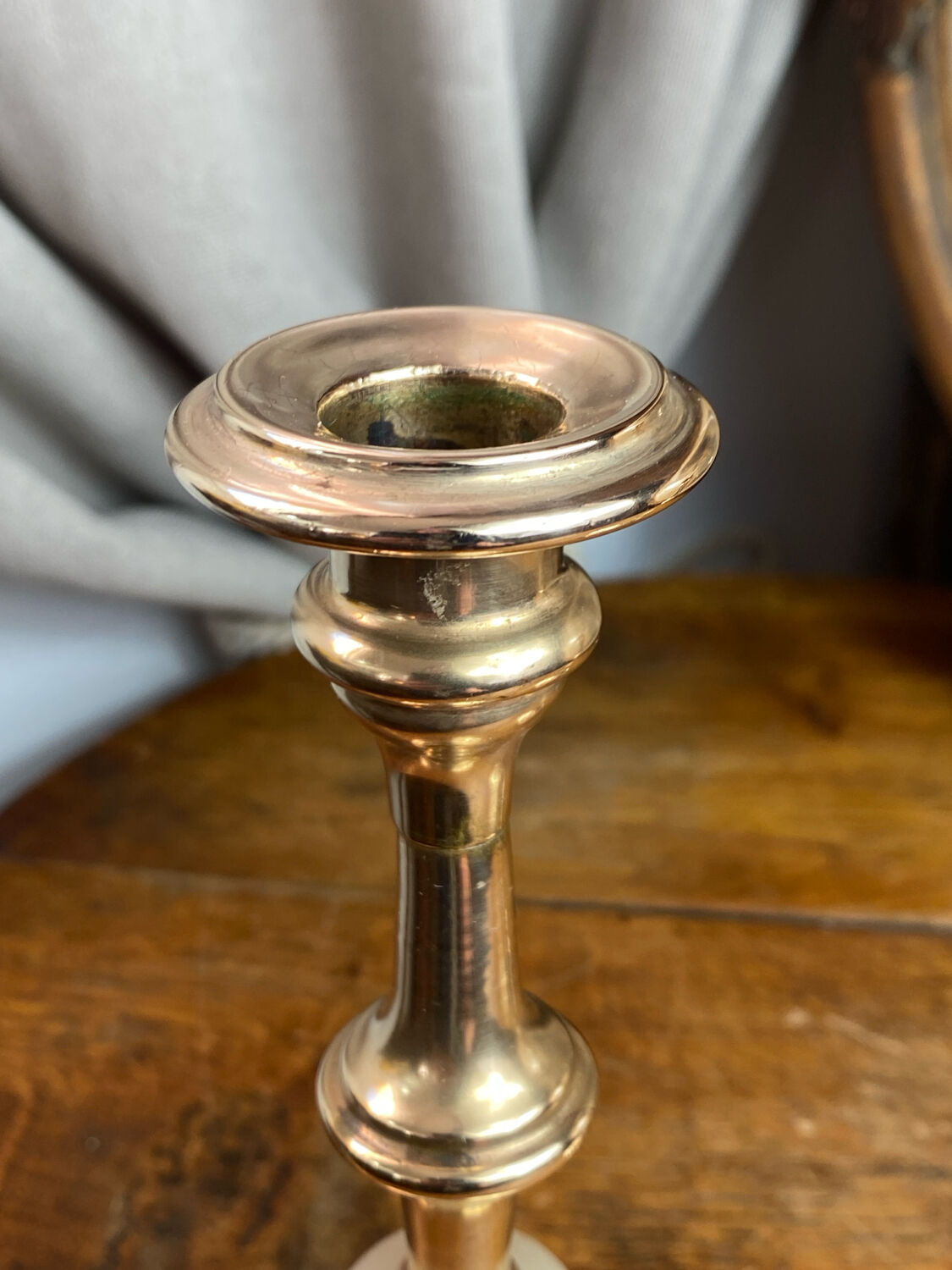 Pair of brass and stone candlesticks