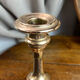 Pair of brass and stone candlesticks