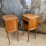 Pair of bedside tables with crossbow base
