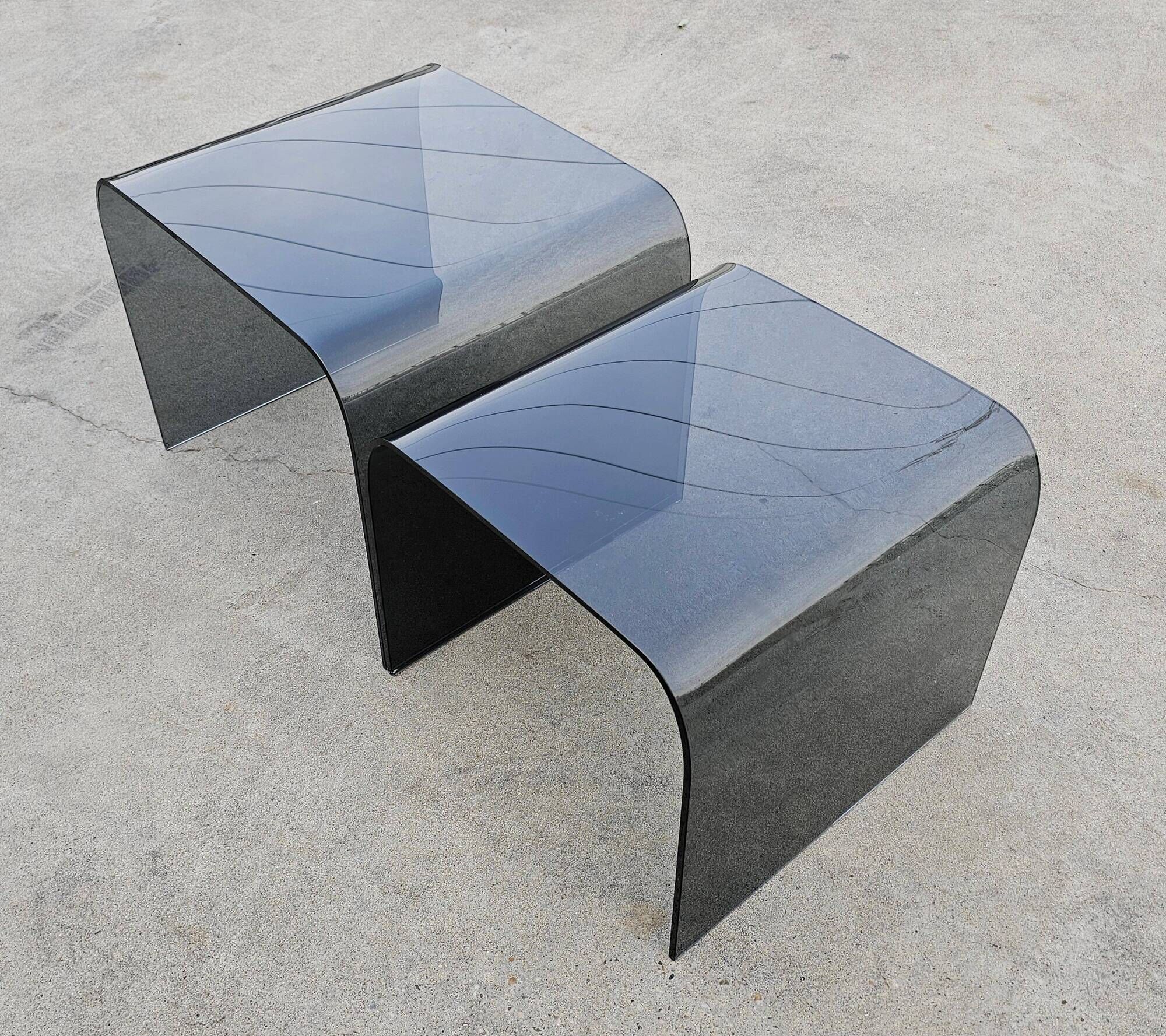 Pair of Waterfall nesting tables in tinted glass attributed to FIAM 1980s.