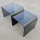 Pair of Waterfall nesting tables in tinted glass attributed to FIAM 1980s.