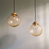 Pair of amber bubble glass pendant lights, 1970s