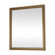 Antique mirror with a gilded frame and beaded border.
