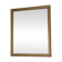 Antique mirror with a gilded frame and beaded border.