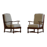 Modern Danish design, a pair of high-backed armchairs in oak and lambswool, 1950s.