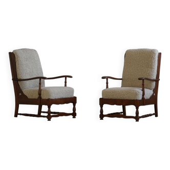 Modern Danish design, a pair of high-backed armchairs in oak and lambswool, 1950s.